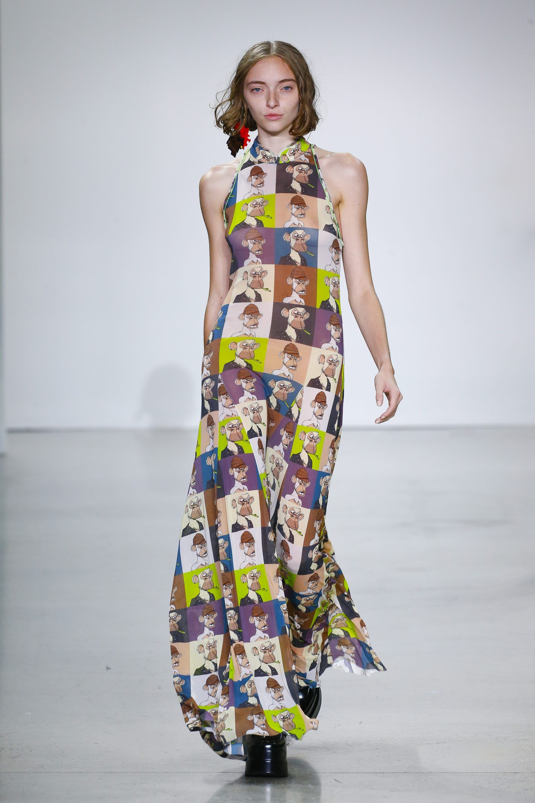 Female model with long printed dress at Metaverse, Past, Present, and Future SS23 show at New York Fashion Week